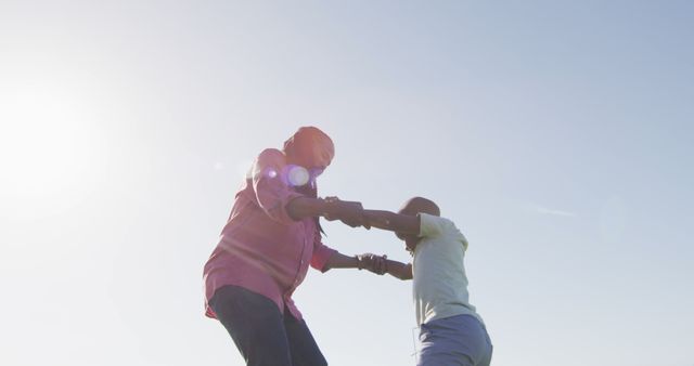 Father and Son Bonding Time Under the Sunlight Outdoors - Download Free Stock Images Pikwizard.com