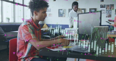 Businessman Analyzing Data with Financial Graphs at Office