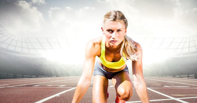 Female athlete ready to run outdoors on a track with a stadium background. Perfect for advertisements or articles focusing on women's sports, fitness motivation, athleticism, and healthy lifestyle promotions. Can be used for blog posts, sports gear, athletic training materials, and motivational content.