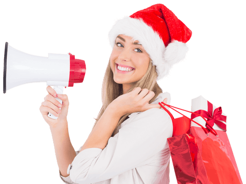 Image shows smiling woman wearing Santa hat carrying a megaphone in one hand and red gift bags in the other.