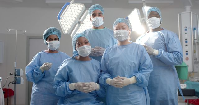 Diverse Medical Team in Surgical Attire in Operating Room - Download Free Stock Images Pikwizard.com