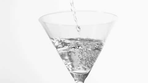 Martini being Poured into Glass in Slow Motion