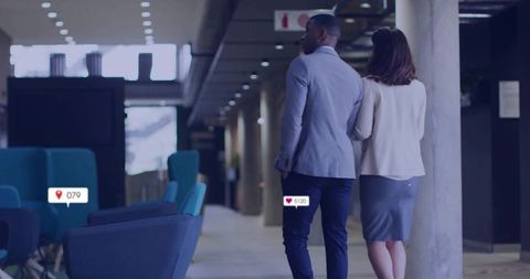 Business Professionals Walking Through Sleek Modern Office Corridor