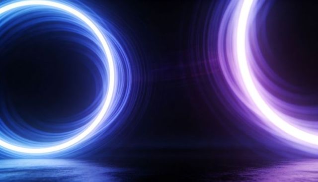 Glowing cyan and magenta neon rings reflecting on dark floor futuristic light portal