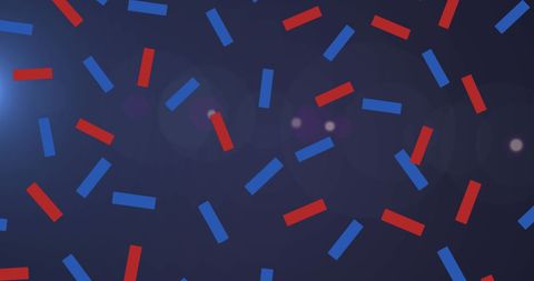 Vibrant blue and red confetti on navy background for celebrations