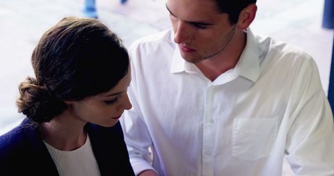 Couple Sitting in Cafe Engaged in Emotional Exchange - Download Free Stock Images Pikwizard.com