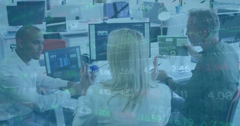 Collaborative Financial Analysis in Modern Office Environment - Download Free Stock Images Pikwizard.com
