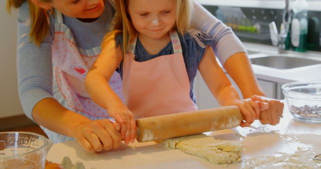 Mother and Daughter Baking in Kitchen with Rolling Pin - Download Free Stock Images Pikwizard.com