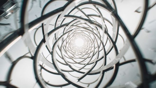 Futuristic spiral tunnel with metallic rings