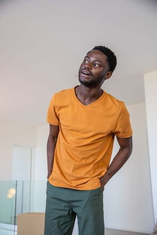 Man Relaxing in Modern Minimalist Home Interior