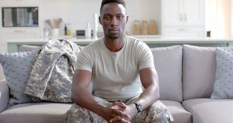 Confident African American Soldier Relaxing at Home After Deployment - Download Free Stock Images Pikwizard.com