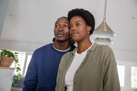 Romantic African American Couple in Modern Living Room Decor