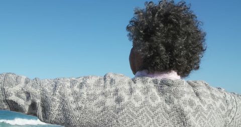 senior woman enjoying freedom on beach with outstretched arms - Download Free Stock Images Pikwizard.com