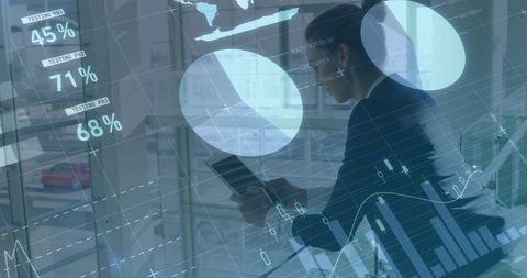 Data visualization with businesswoman analyzing statistics