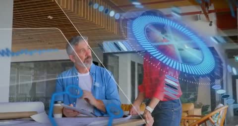 Architects Discussing Holographic Designs in Innovative Office