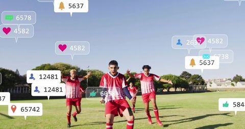 Young soccer players celebrating goal with social media notifications and likes