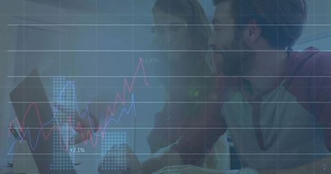 Collaborating Analysts Discussing Data with Line Charts in Modern Office