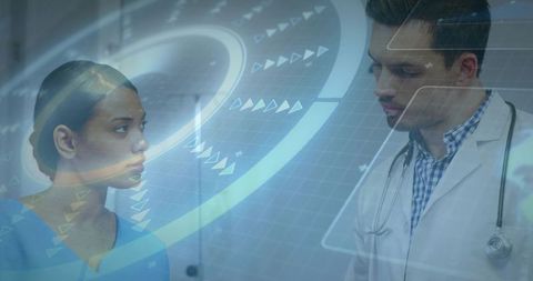 Doctor and nurse collaborating with augmented reality medical data hud