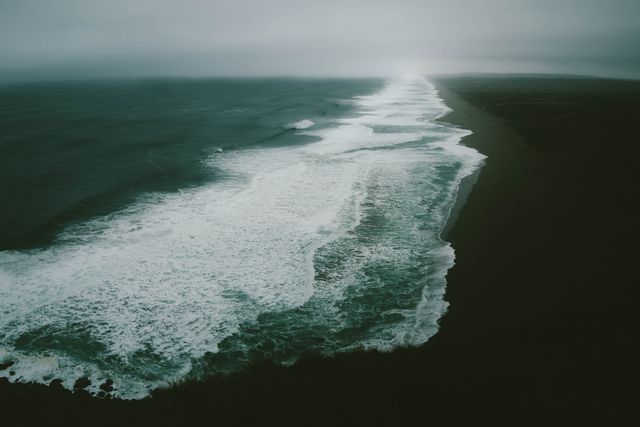 Majestic Ocean Waves Crashing on Remote Coastline at Dusk - Download Free Stock Photos Pikwizard.com