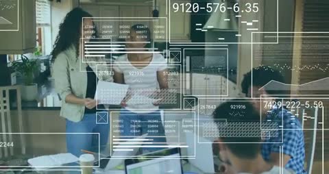 Team Collaborating with Digital Interfaces at Kitchen Table