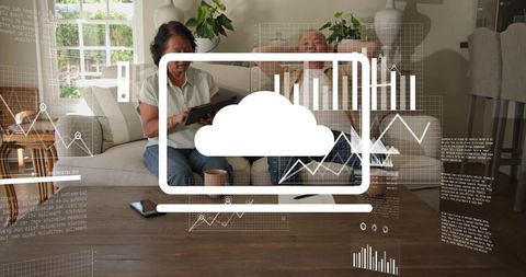 Mature couple using tablet with cloud analytics overlay in cozy living room