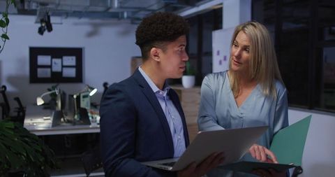 Business Professionals Collaborate in Modern Office Environment