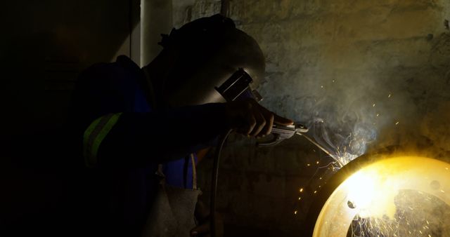 Welder in Protective Gear Working with Bright Sparks - Download Free Stock Images Pikwizard.com