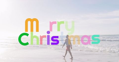 Sunlit Beach with Vibrant Merry Christmas Text Overlay - Download Free Stock Images Pikwizard.com