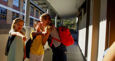 Children Teasing Schoolboy in Corridor - Download Free Stock Images Pikwizard.com