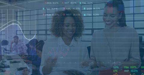 Diverse Professionals Analyzing Stock Market Data in Office