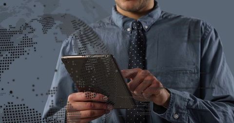Business professional using tablet with dotted global data overlay and live code visualization