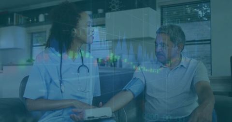 Home Healthcare Visit Nurse Checking Blood Pressure for Elderly Patient