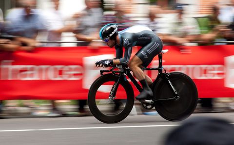 Professional cyclist competing in high-speed race
