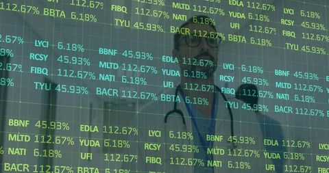 Doctor studying stock market data overlay representing financial health for healthcare