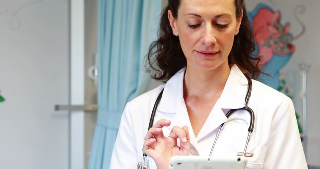 Female Doctor Using Tablet for Patient Management - Download Free Stock Images Pikwizard.com