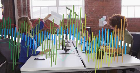 Diverse Team Analyzing Business Reports with Digital Graphs