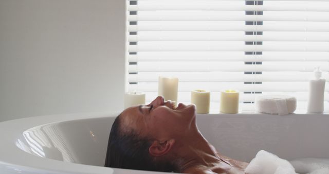 Woman Relaxing in Bathtub Near Candles - Download Free Stock Images Pikwizard.com