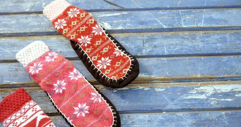 Cozy Winter Socks on Rustic Blue Wooden Planks - Download Free Stock Images Pikwizard.com