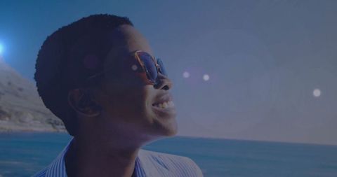 Joyful Woman Enjoying Scenic Coastal View on Sunny Day