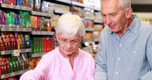 Senior Couple Grocery Shopping in Supermarket Aisle - Download Free Stock Images Pikwizard.com