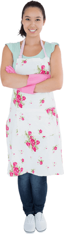 smiling woman wearing floral apron and transparent pink gloves - Download Free Stock Videos Pikwizard.com