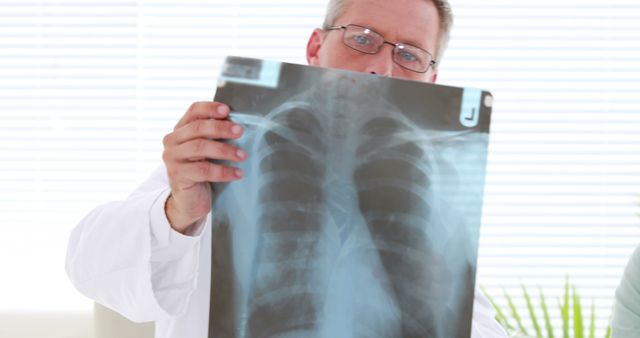 Doctor Examining Chest X-Ray in Hospital Room - Download Free Stock Images Pikwizard.com