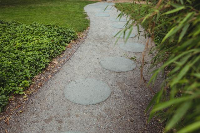 Ideal for use in articles or blogs about garden design, landscaping ideas, and outdoor living spaces. Perfect for illustrating concepts of tranquility, nature, and serene environments. Can be used in promotional materials for gardening services or landscape architecture.