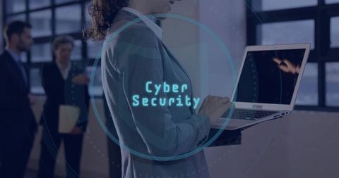 Female manager monitoring cybersecurity on laptop with futuristic holographic interface