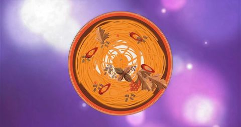 Serving top-down noodle bowl with chili slices, star anise and peppercorn on purple bokeh