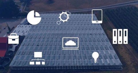 Aerial greenhouse with transparent roof and agritech icons representing smart farming
