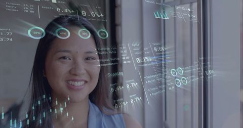 Smiling Businesswoman with Virtual Financial Data Overlay in Office Scene