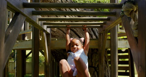 Joyful Girl on Playground Adventure at Home