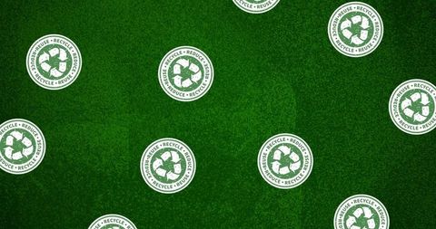 Recycling symbols on a green background promoting sustainability