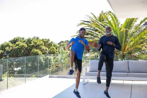 Family Fitness with High Knees on Sunny Terrace